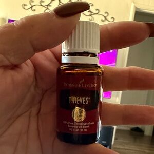 Young Living 100% Thieves Essential Oil. Opened but not used.